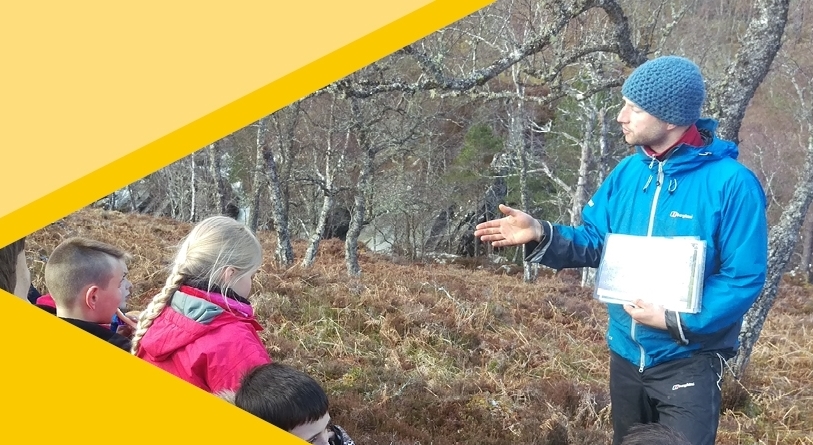Sam Harrison with a group of children at the Shieling Project